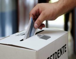 votar
